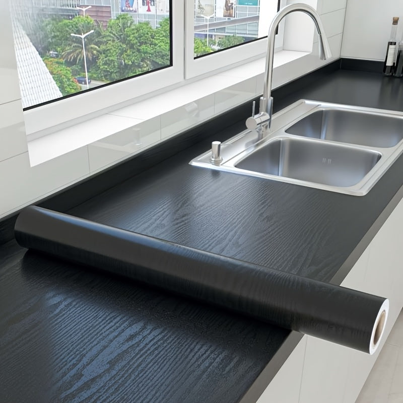 Виниловая пленка с древесной текстурой для кухонных столешниц и дверей шкафов, водонепроницаемая и самоклеящаяся. Подходит для варочных панелей и легко снимается во время ремонта. Особенности: стильный дизайн.