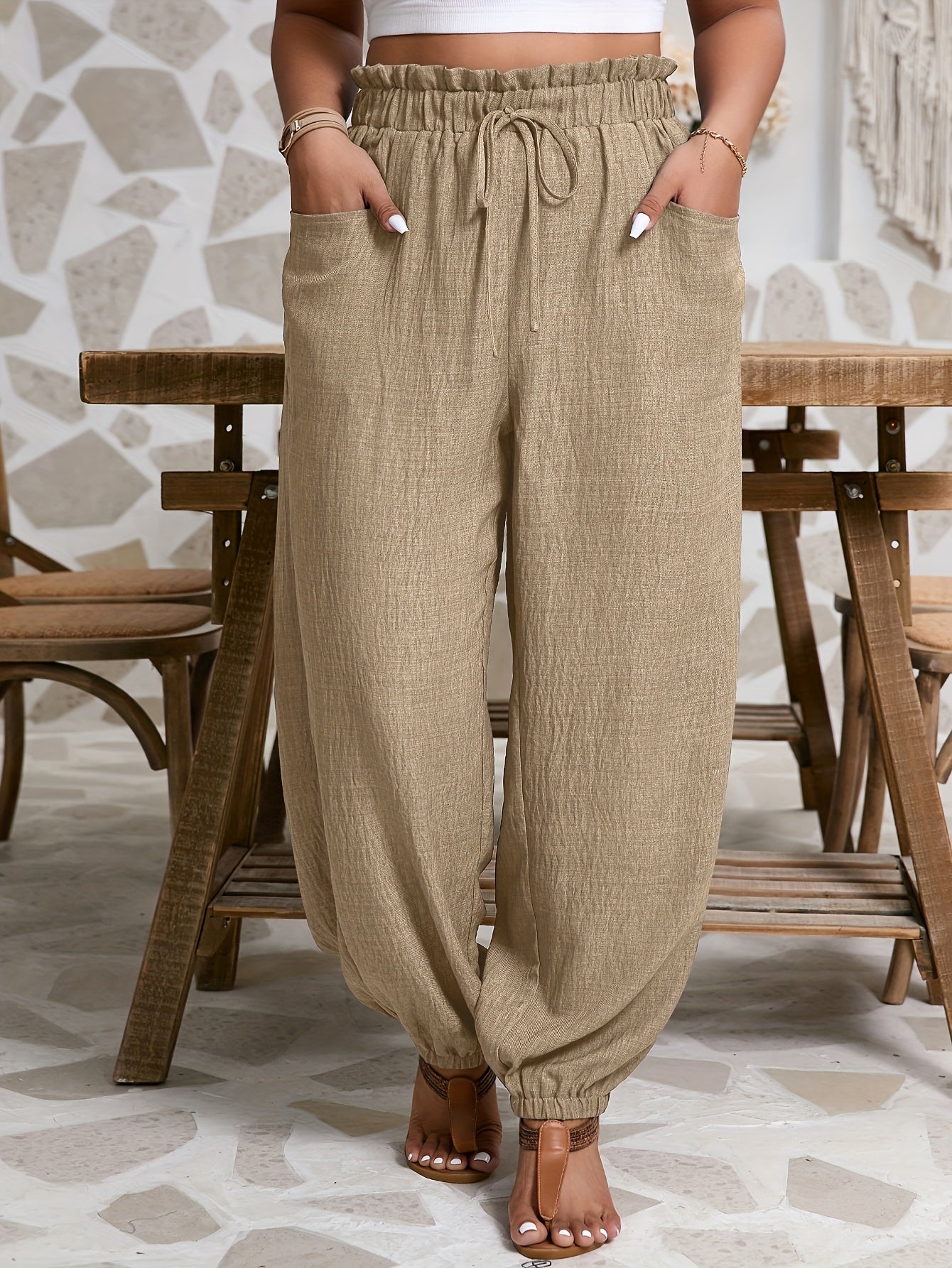 Pantalones casuales de talla grande para mujer con cintura elástica, bolsillos y color sólido