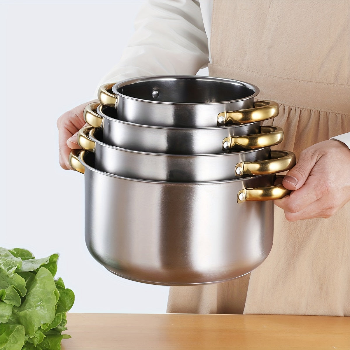 Juego de 4 ollas de acero inoxidable con tapas de 18cm a 24cm de diámetro