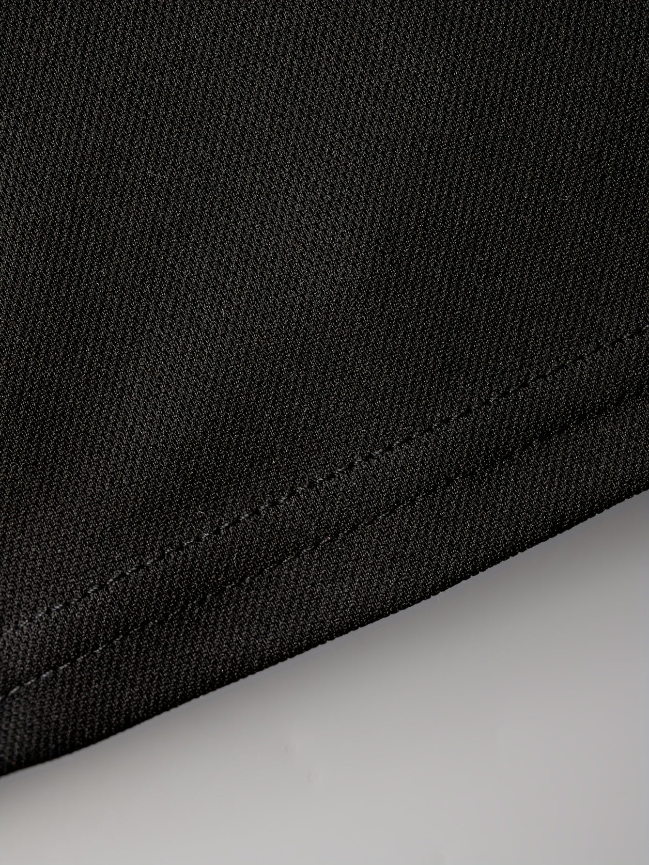 Camisa de punto para niños en verano, en blanco y negro, de manga corta, con bolsillo, top casual