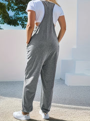 Pantalones de mujer de talla grande con bolsillos de moda y tirantes con correa trasera