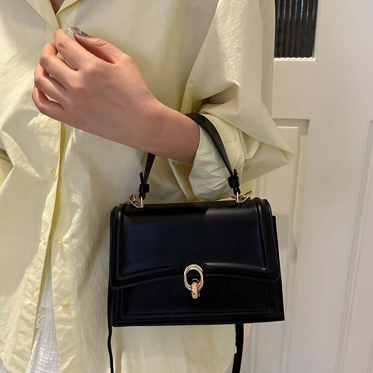 Women's Black Synthetic Leather Handbag with Retro Flap and Gold Hardware