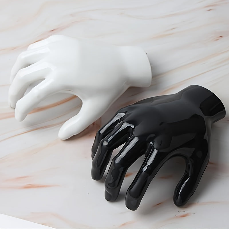 Uyda kalitlar va quloqchinlar uchun kuchli, burgusiz, iz qoldirmaydigan saqlash uchun palma shaklidagi yopishqoq devor osgichi.