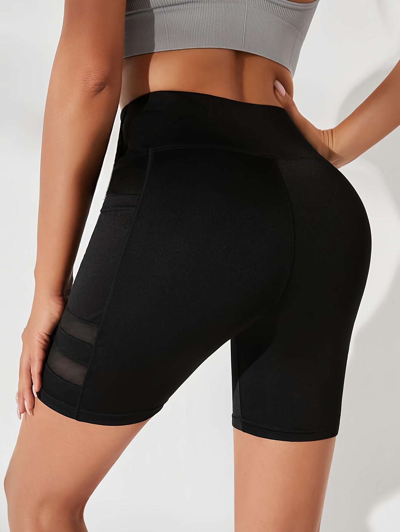 High-Waist Cycling Shorts with Mesh Panels and Pockets for Fitness and Sports