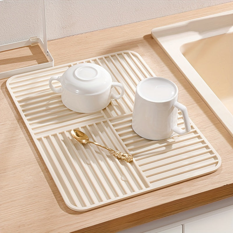 Estera de silicona beige para secar platos con relieves elevados, plegable, resistente al calor, absorbente y organizador de cocina
