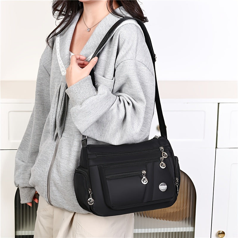 Ayollar uchun ko'p funksiyali kesim sumkasi, sozlanadigan kamar, bir nechta bo'limlar, zip yopilishi va polyester astar bilan xarid qilish, ofis va sayohat uchun, bir nechta ranglarda mavjud.