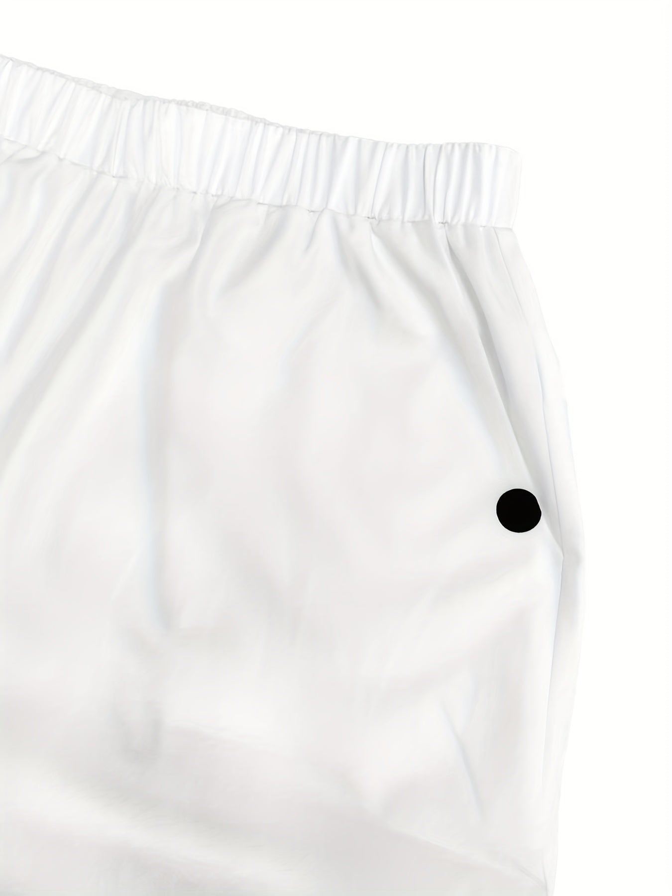 Pantalones harem de talla grande para mujer con estampado de diente de león en negro y bolsillos