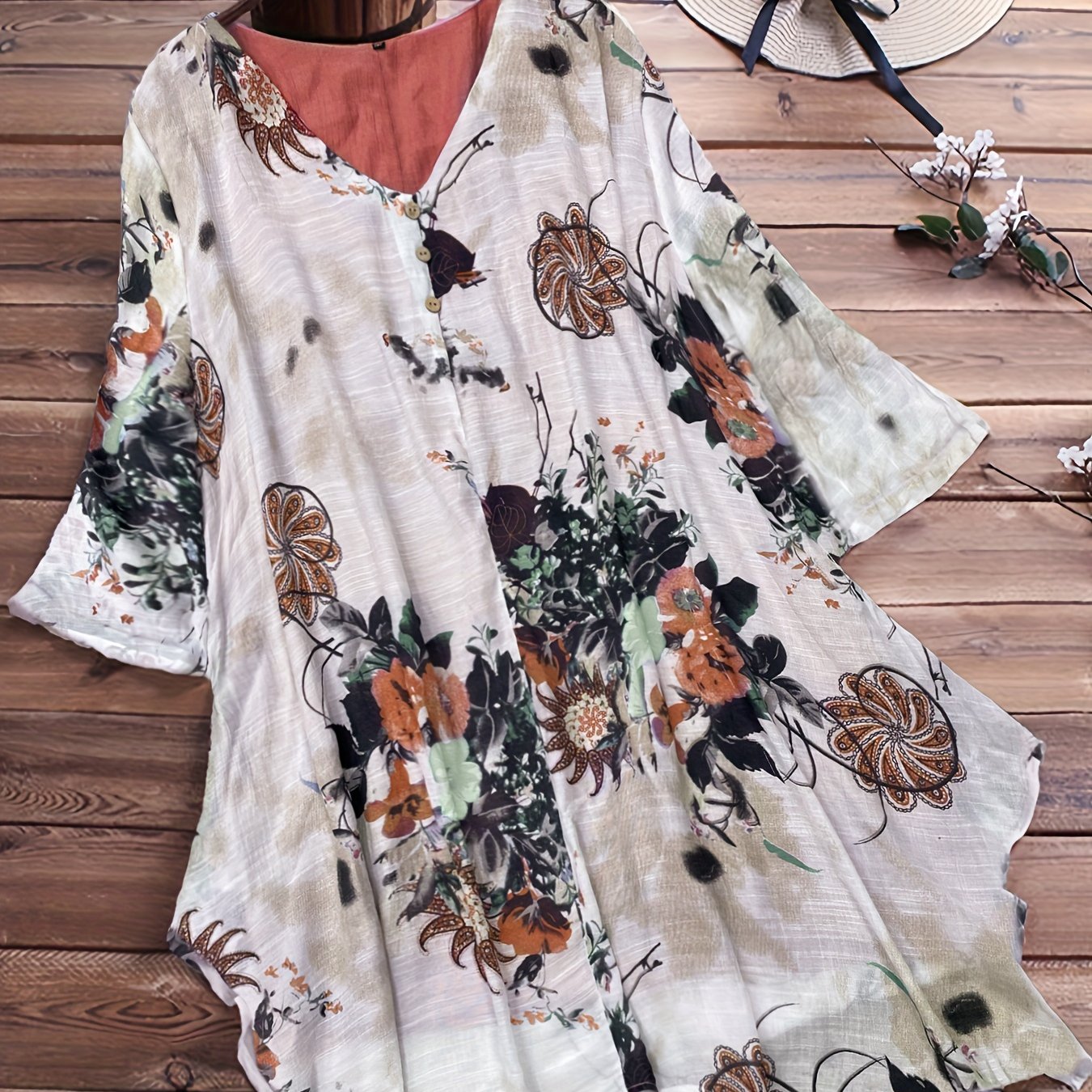 Women's Plus Size Casual Floral V-Neck Top with Short Sleeves and Asymmetrical Hem