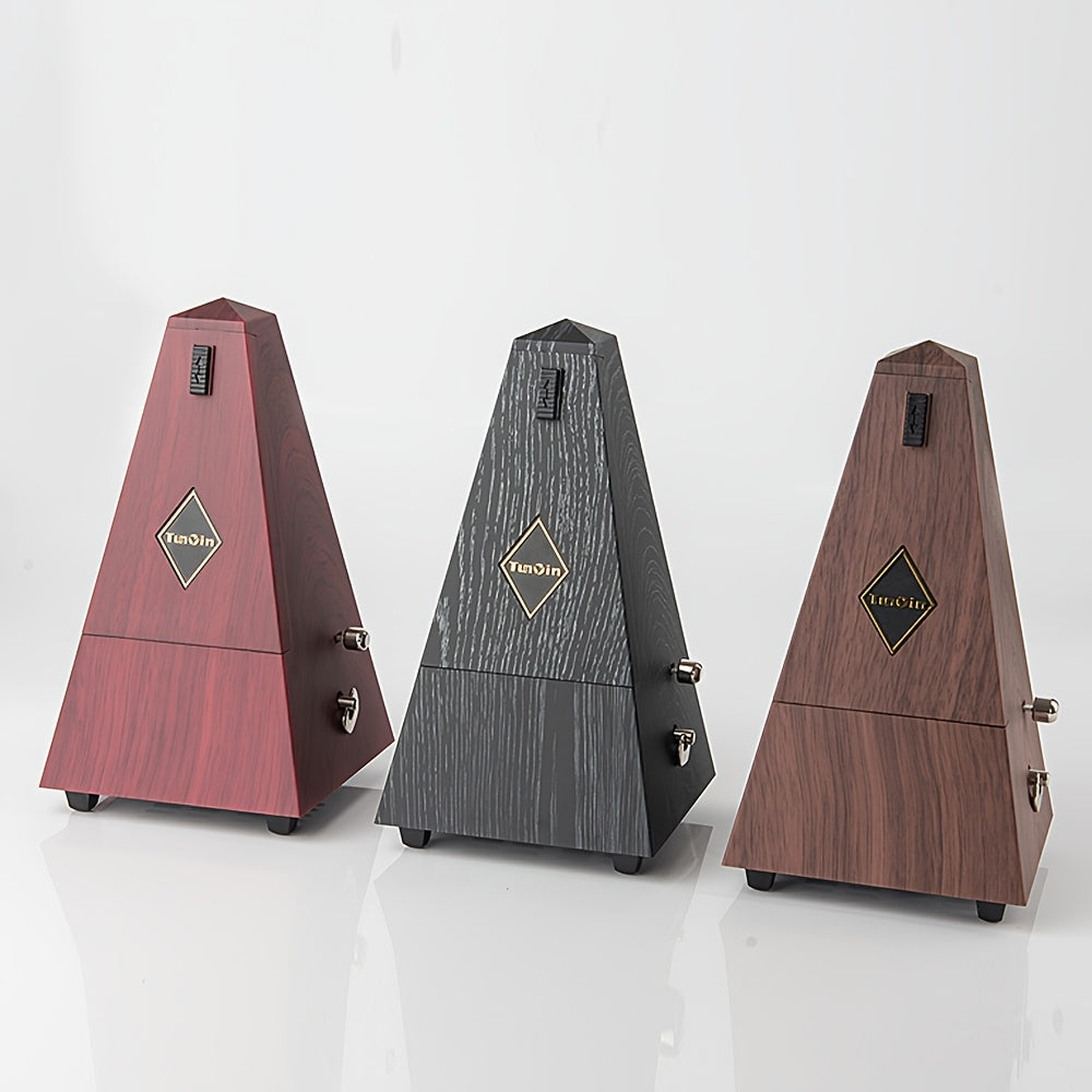 Uch rangli va toza mis mexanizmi bilan ta'minlangan minorali metronom, turli asboblar uchun mo'ljallangan va boshlovchilar uchun mos keladi, bu esa uni maxsus tadbirlarda musiqa ixlosmandlari uchun ajoyib sovg'a qiladi.