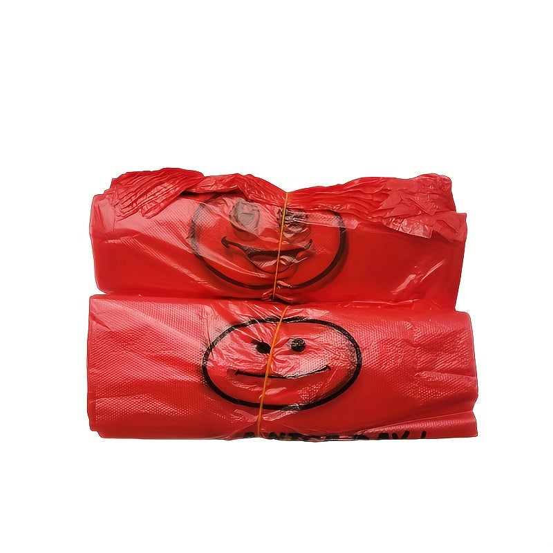 Pack of 50 Red Plastic T-Shirt Bags with Joyful Face Design, Reusable and Strong