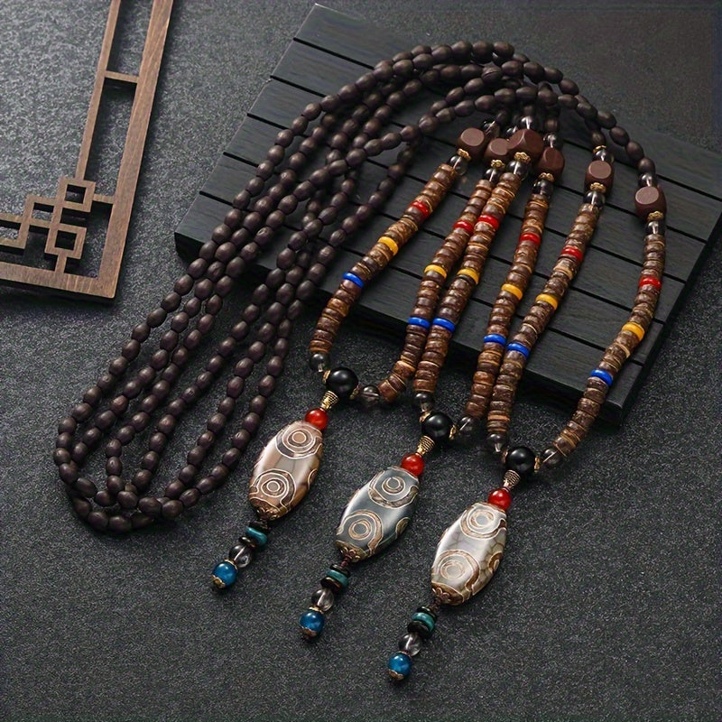 Sovg'a marjon: Boho uslubidagi yog'och beadli pandant bilan uzun sviter zanjiri, o'yma zargarlik