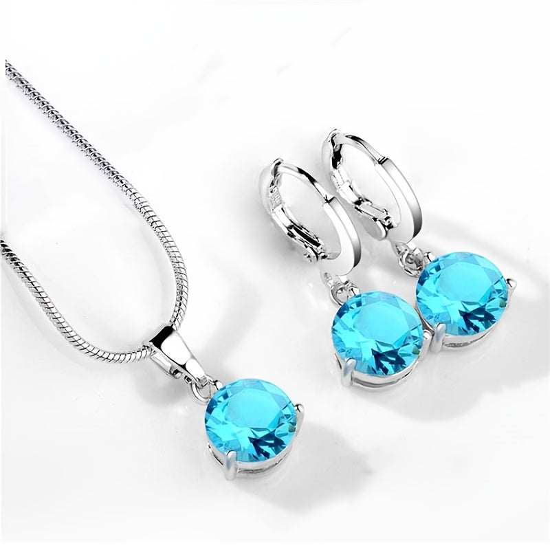 Kristal Zirconia pendanti, oq qotishmada rhinestone aksentlari bilan taqilgan marjon va bilaguzuklar to'plami, to'ylar va nikohlar uchun ideal, dumaloq shaklda, qizlar uchun mos.
