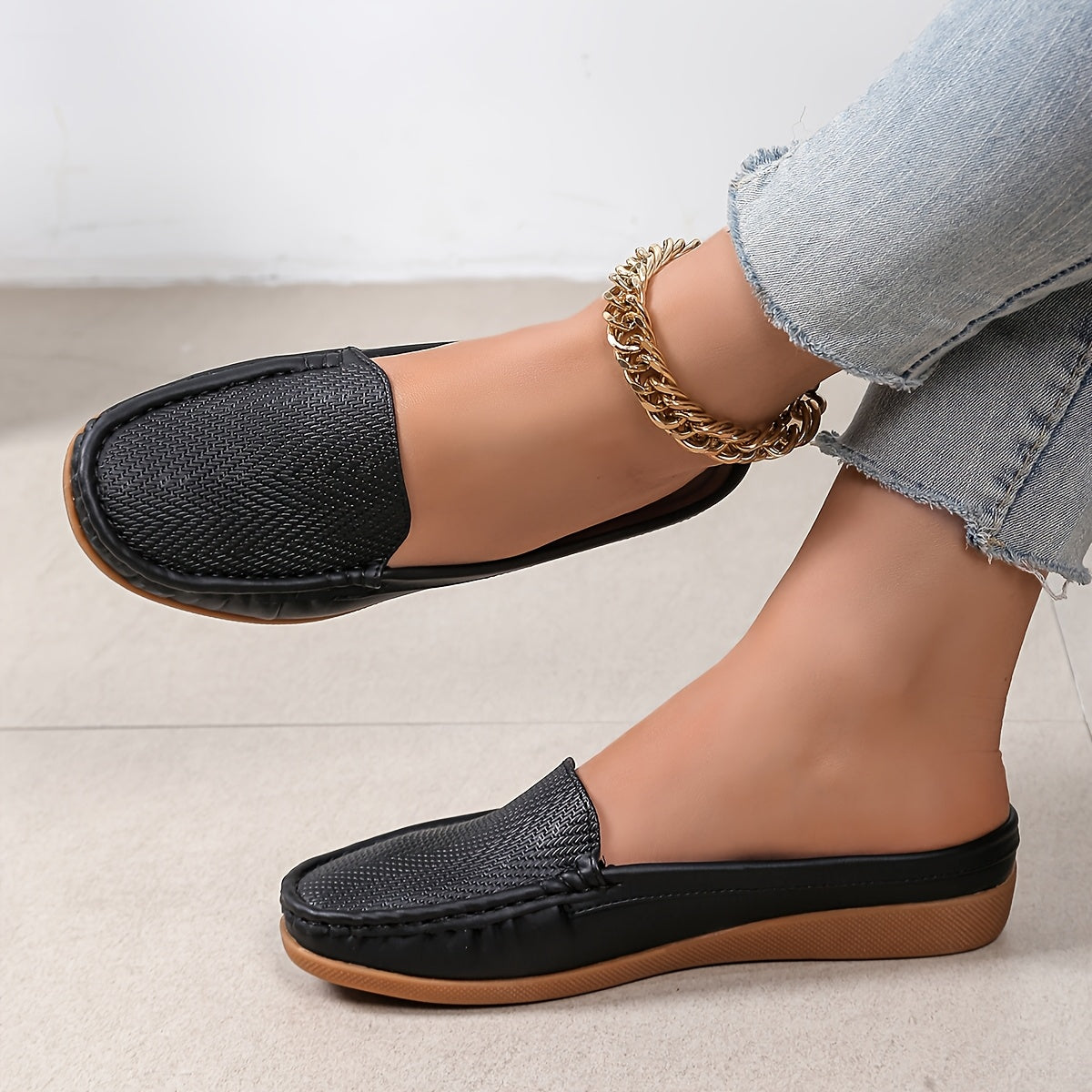 Zapatillas slip-on negras para mujer con cubierta de imitación, suela de corcho y diseño transpirable