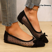 Zapatos planos de mujer en malla negra con lazo y estilo slip-on