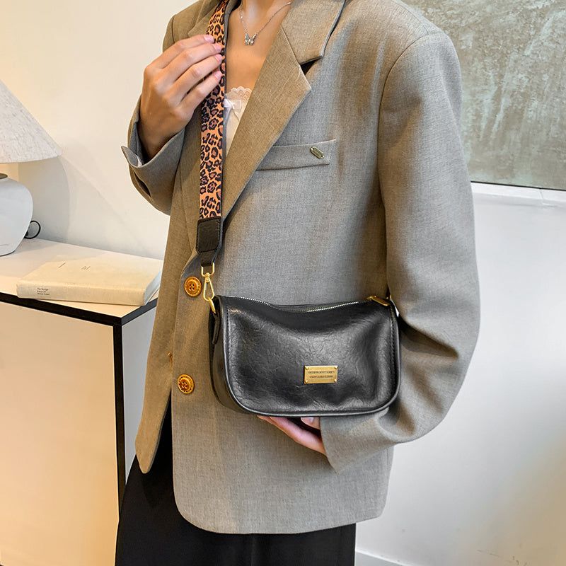 Women's Shoulder Bag with Adjustable Leopard Print Strap Zipper Closure Edge Paint Detail