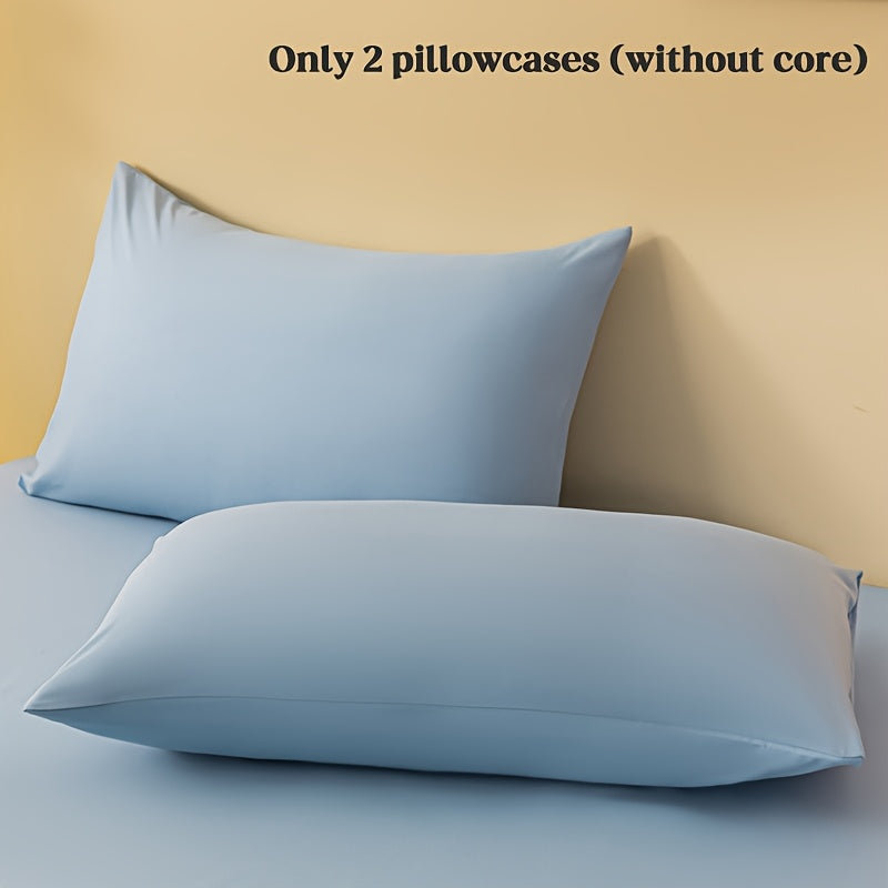 2 ta yostiq qopqog'i, bir rangda, yumshoq va qulay polyester materialidan tayyorlangan, konvert yopilishi bilan, yuvish mashinasida tozalash oson, 90gsm, yotoqxona, mehmonxona yoki mehmonxona to'shagi uchun ideal.