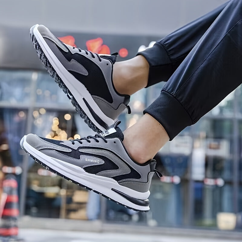 DUNSON erkaklar uchun qora va kulrang rangdagi, oq aksentli nafas oladigan to'rli sport krossovkalari. Sirpanishga qarshi, hidga chidamli, yumshoq kauchuk taglik, sport va bo'sh vaqt uchun bog'ichli.