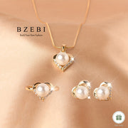 Set of Four Titanium and 18K Gold Plated Jewelry Pieces with Heart Design and Milky Stone