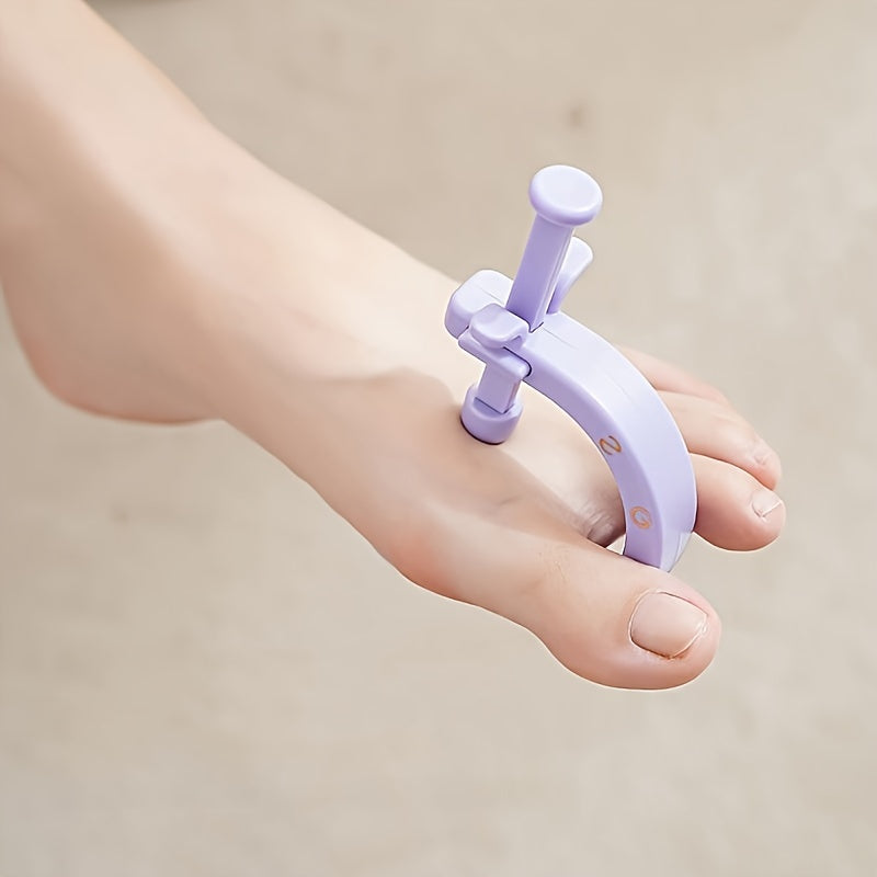 Barmoq, palma va bilak og'rig'ini kamaytirish uchun tuzilgan, teksturali tutqichga ega bo'lgan, moslashuvchan binafsha rangli qo'l va oyoq akupressura massaj qiluvchi.