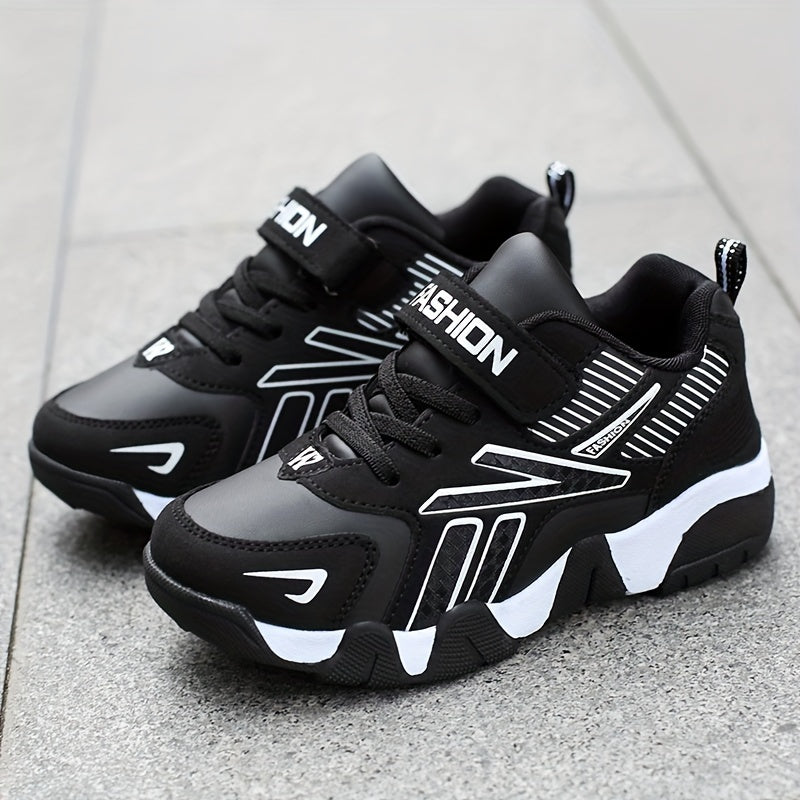 "Preppy bolalar" modasidagi sport krossovkalari, tasodifiy sport uslubi, chiziqlar, bog'ich va lenta yopilishi, pastki PU ustki qismi, TPR tagligi va 14 yoshgacha bo'lgan bolalar uchun sirpanmaydigan yugurish poyabzallari.