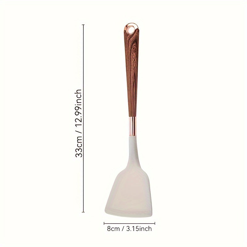Silicone yog'och to'qimalari spatula, yopishmaydigan qoplama va issiqqa chidamli tutqich bilan, uyda pishirish uchun zarur bo'lgan oshxona asbobi