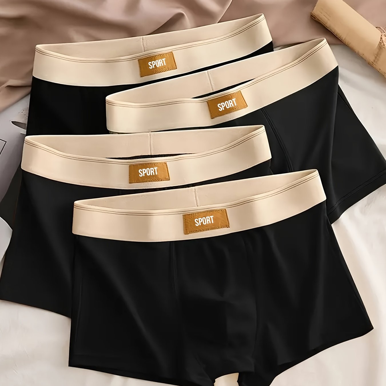 Erkaklar uchun 4 ta to'plam boxer shortlari, qulaylik va o'rtacha cho'zilish uchun elastan bilan birga mustahkam rangli polyester to'qima, kundalik kiyish uchun mukammal.