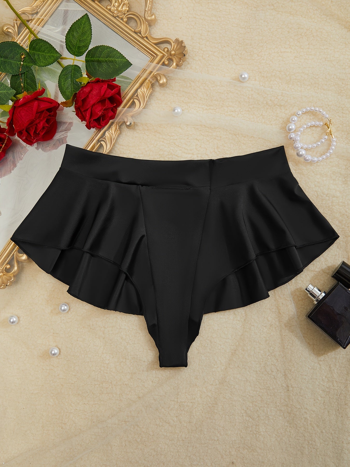 Pantalones cortos de playa tipo tanga para mujer europeos y americanos con parte trasera curva y diseño de borde de hoja