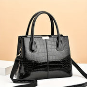 Black Crocodile Pattern Handbag with Adjustable Strap and Zipper Closure
