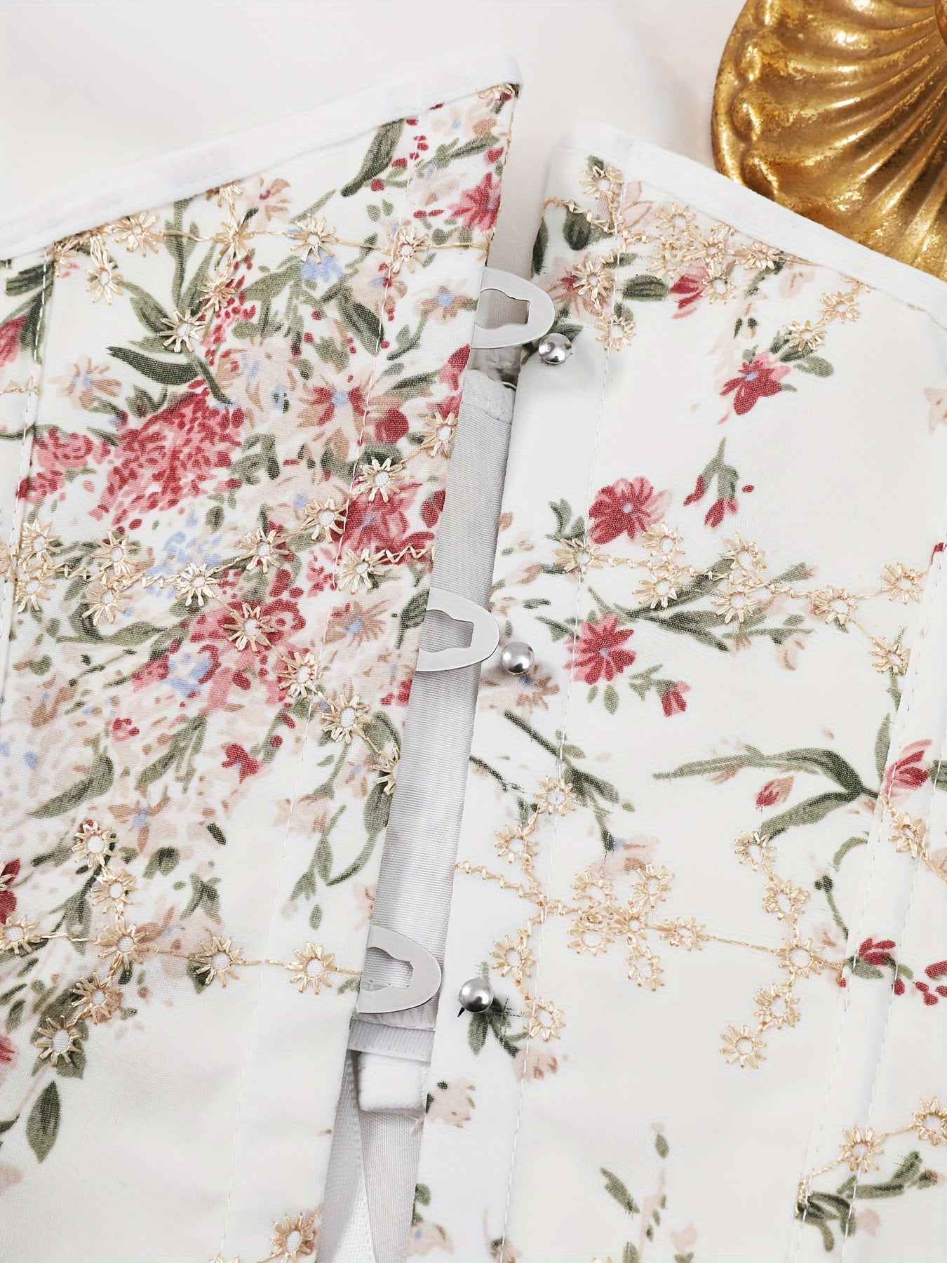 Faja femenina elegante con patrón floral, con espalda ajustable con cordón y botones, ropa moldeadora