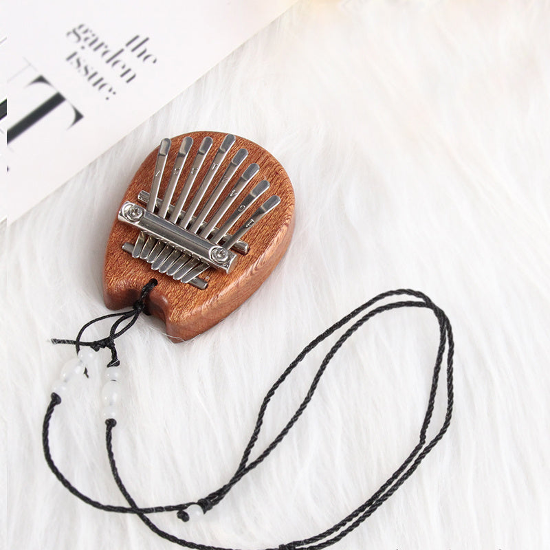 Mini Kalimba Thumb Piano for Beginners and Music Lovers Light Brown Wood 8 Keys Gift for Eid Al-Adha