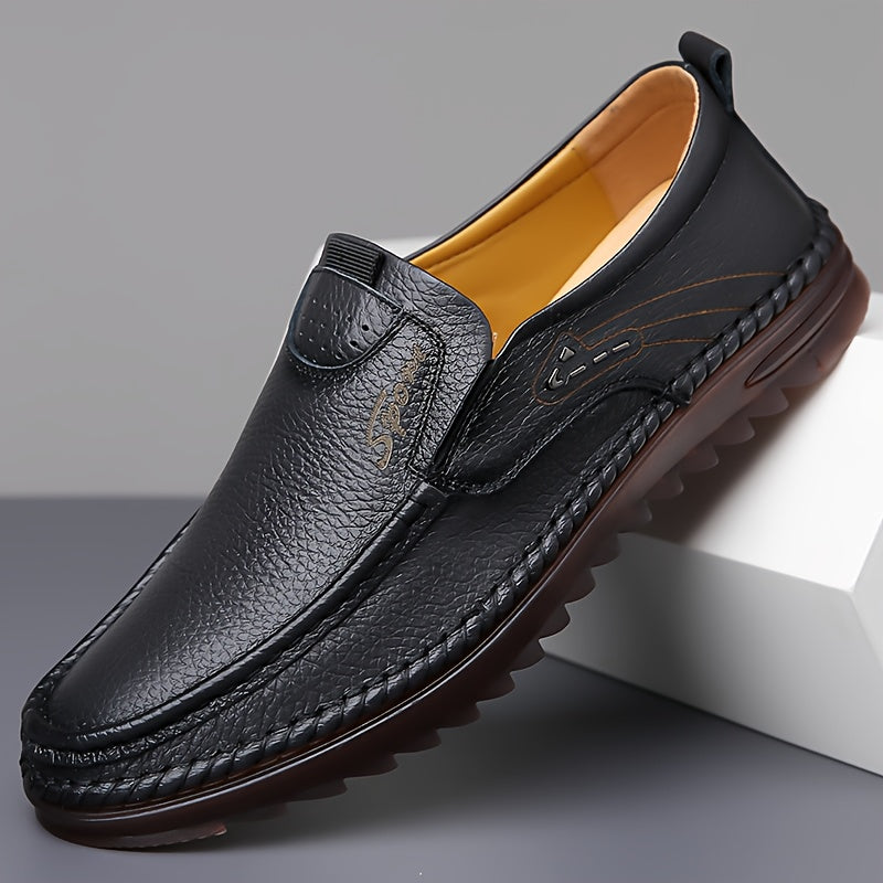 Erkaklar uchun yuqori donali sigir terisidan tayyorlangan, sirpanmaydigan kauchuk taglikka ega slip-on loafer poyabzallari.