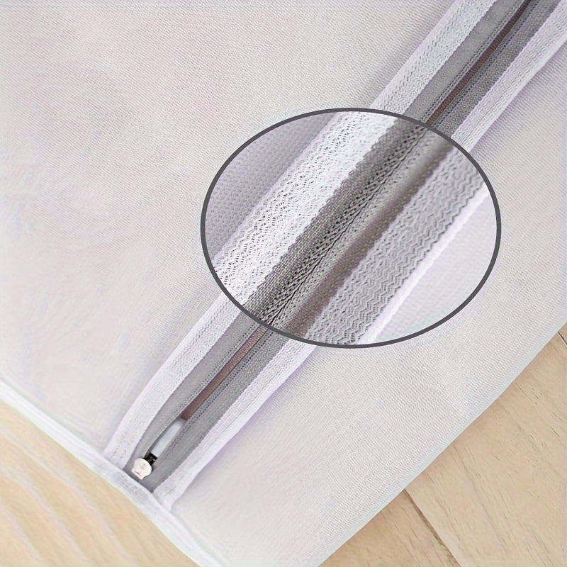 Juego de cuatro bolsas de malla de poliéster extra grandes con cremalleras para prendas delicadas 57x57cm