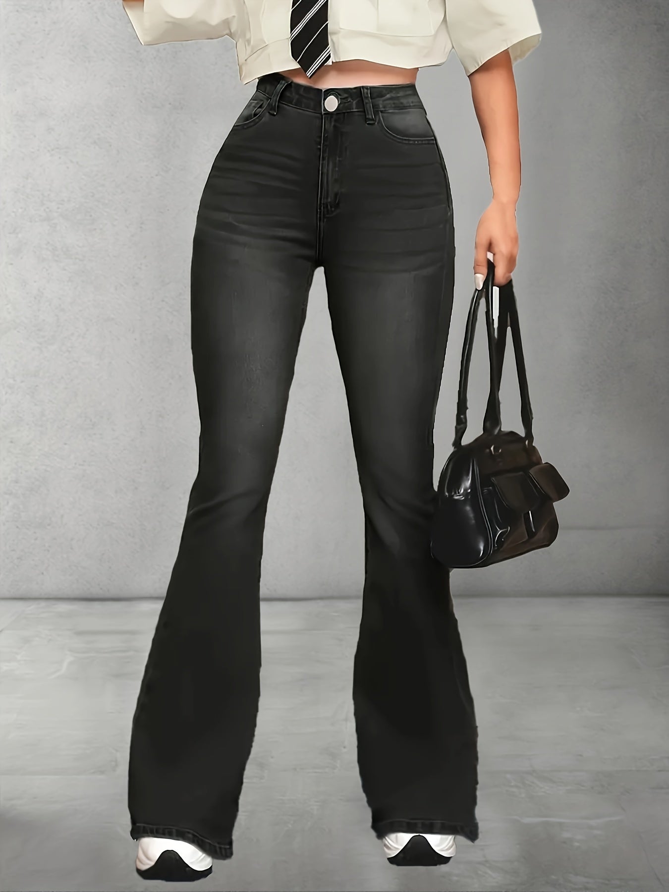 Women's High Waist Flare Leg Jeans in Black Stretch Denim with Whiskering Detail