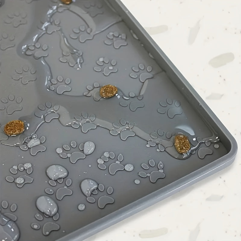 Alfombrilla de silicona gris para mascotas con diseño de huellas para gatos y perros