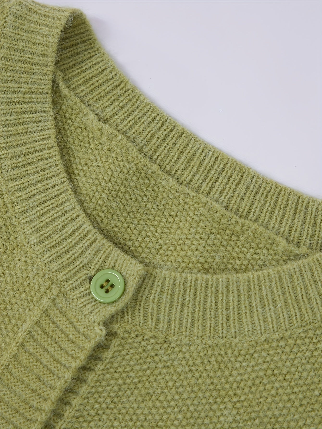 Cárdigan de punto sólido para mujer con hombros caídos, bolsillos y botones en el frente para primavera y otoño