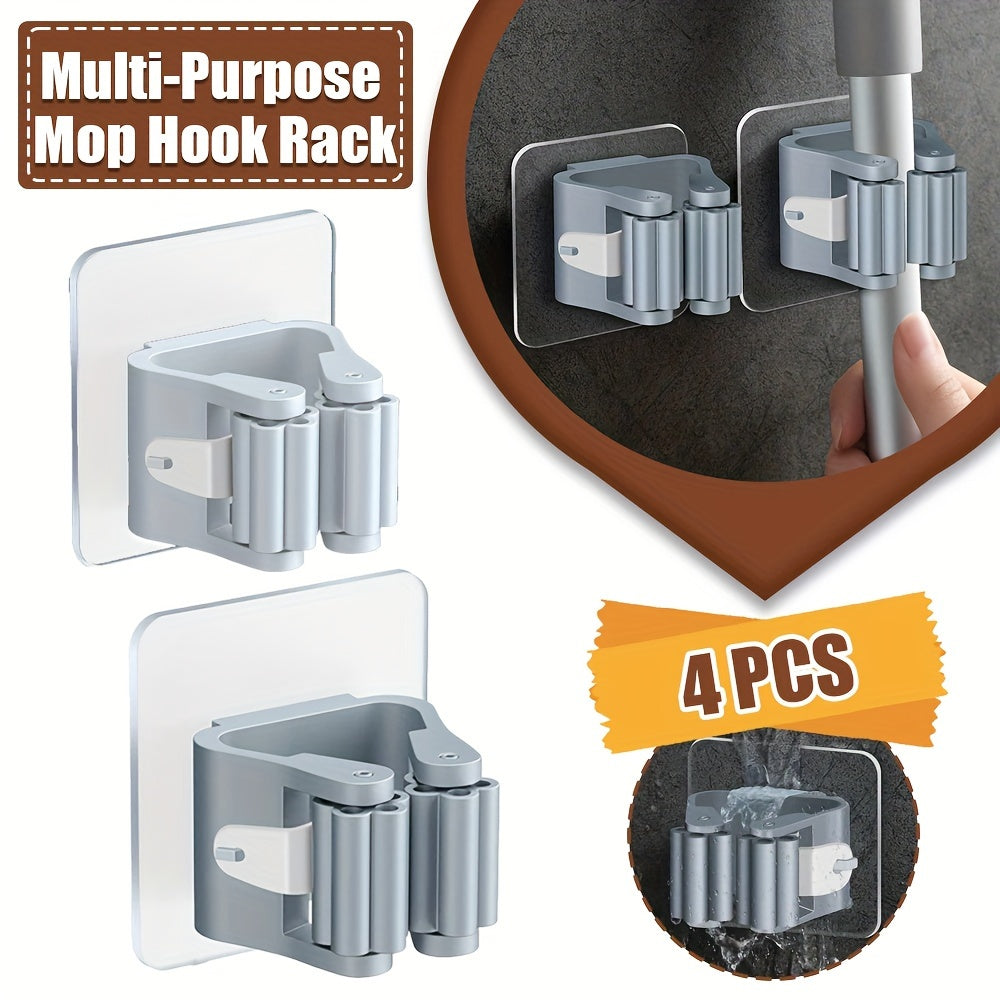 Soporte de pared blanco para trapeador y escoba con múltiples ganchos de plástico para almacenamiento en cocina y baño