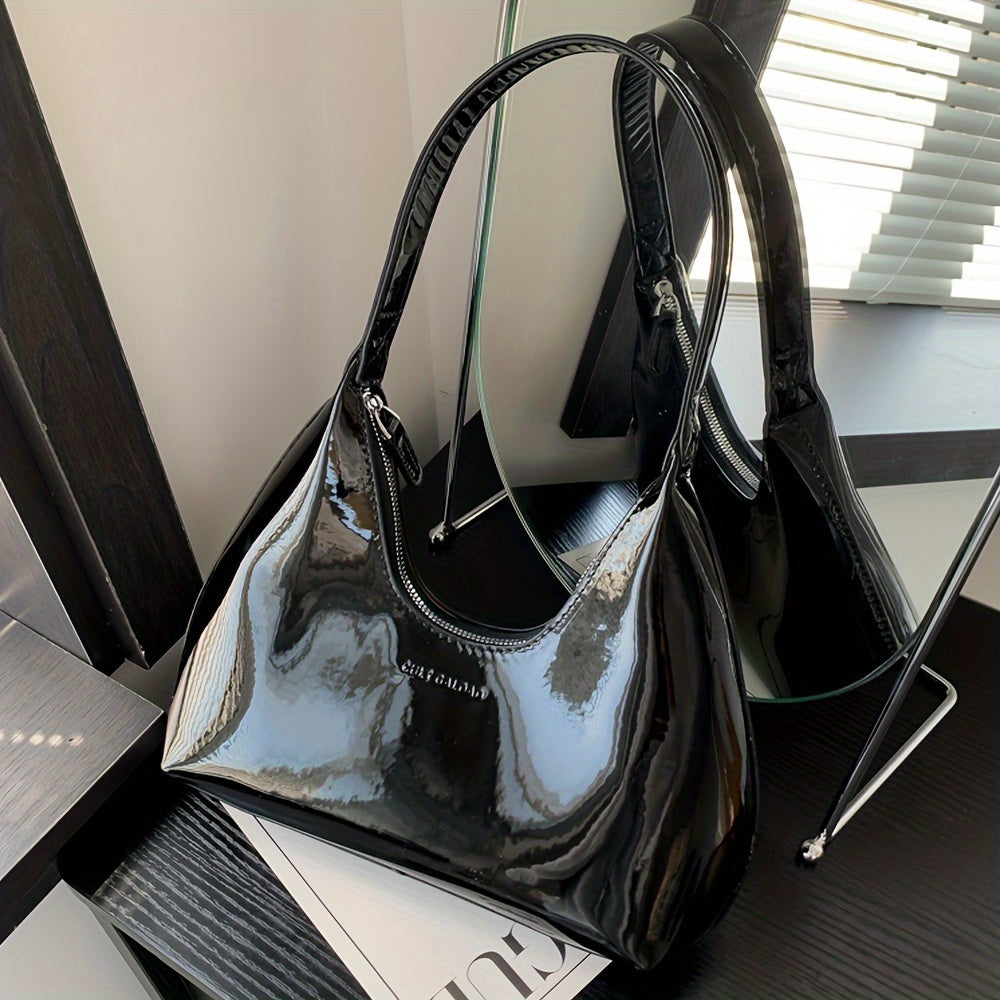 Шикарная красная сумка через плечо с глянцевой лакированной отделкой и застежкой на молнии, идеально подходящая для повседневного использования.