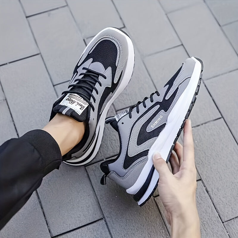 DUNSON erkaklar uchun qora va kulrang rangdagi, oq aksentli nafas oladigan to'rli sport krossovkalari. Sirpanishga qarshi, hidga chidamli, yumshoq kauchuk taglik, sport va bo'sh vaqt uchun bog'ichli.