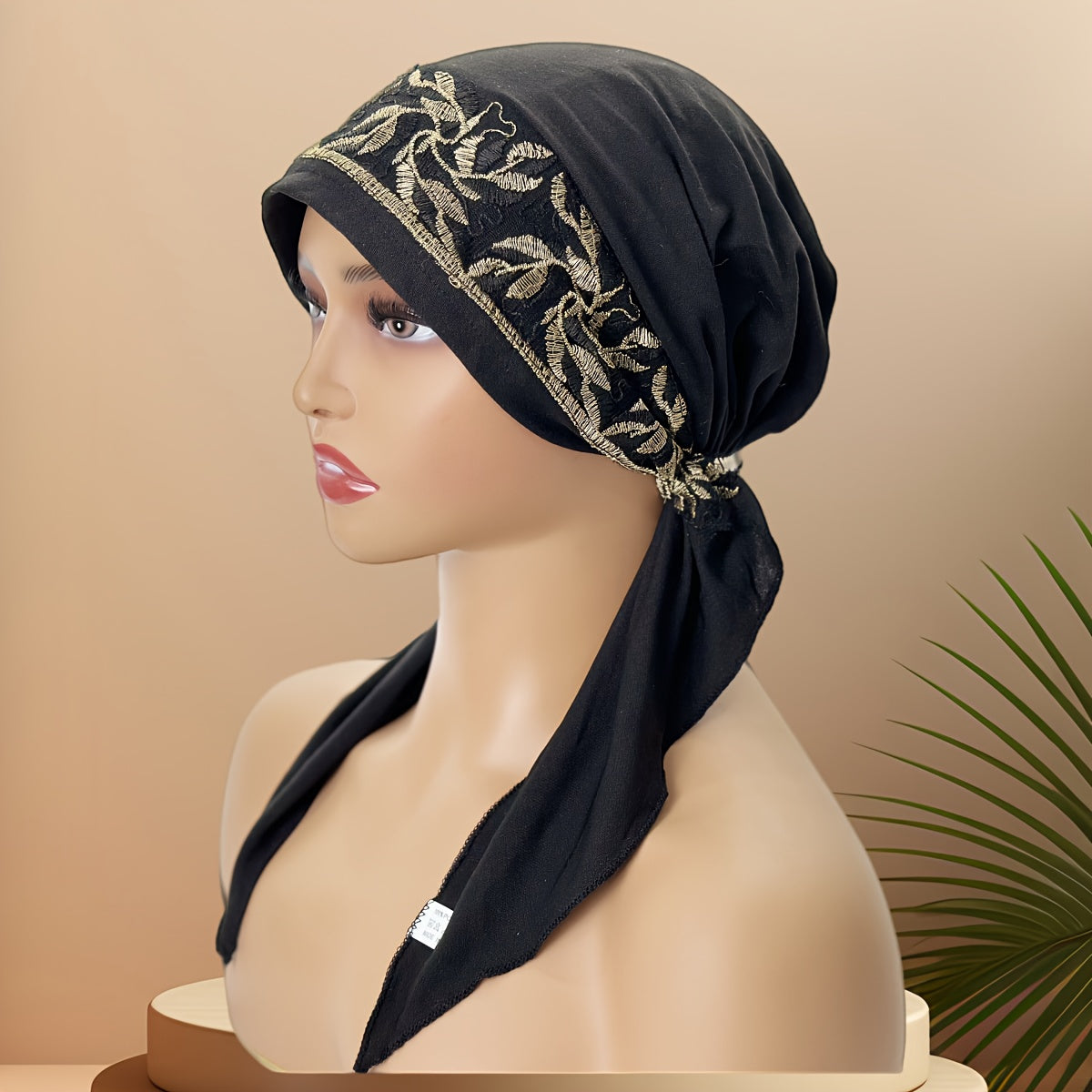 Black Elastic Chemo Hat with Embroidered Turban Design and Tails