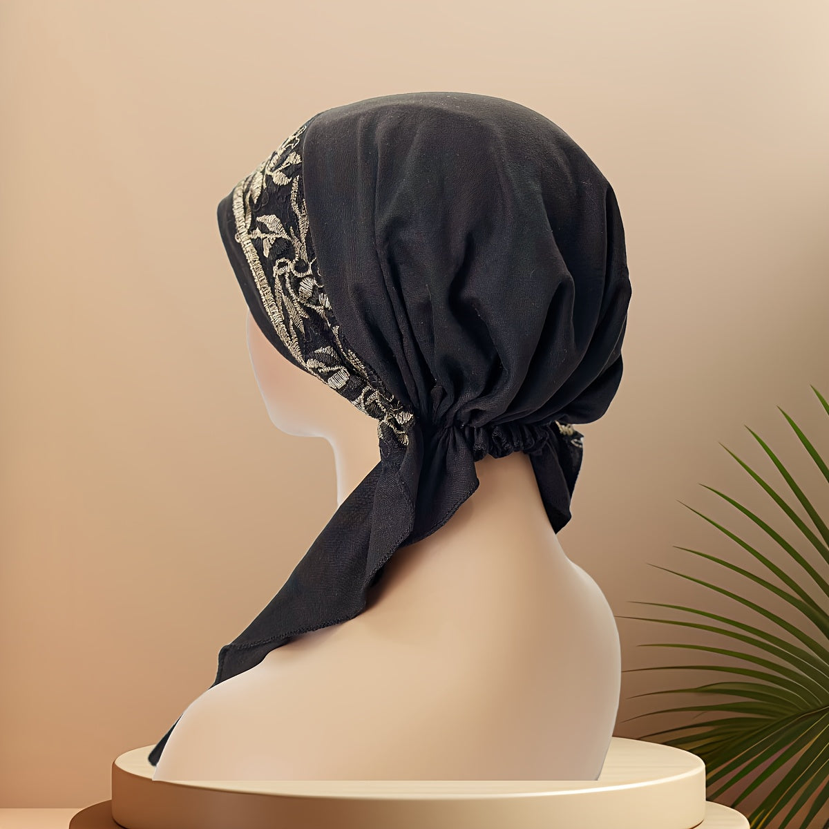 Black Elastic Chemo Hat with Embroidered Turban Design and Tails