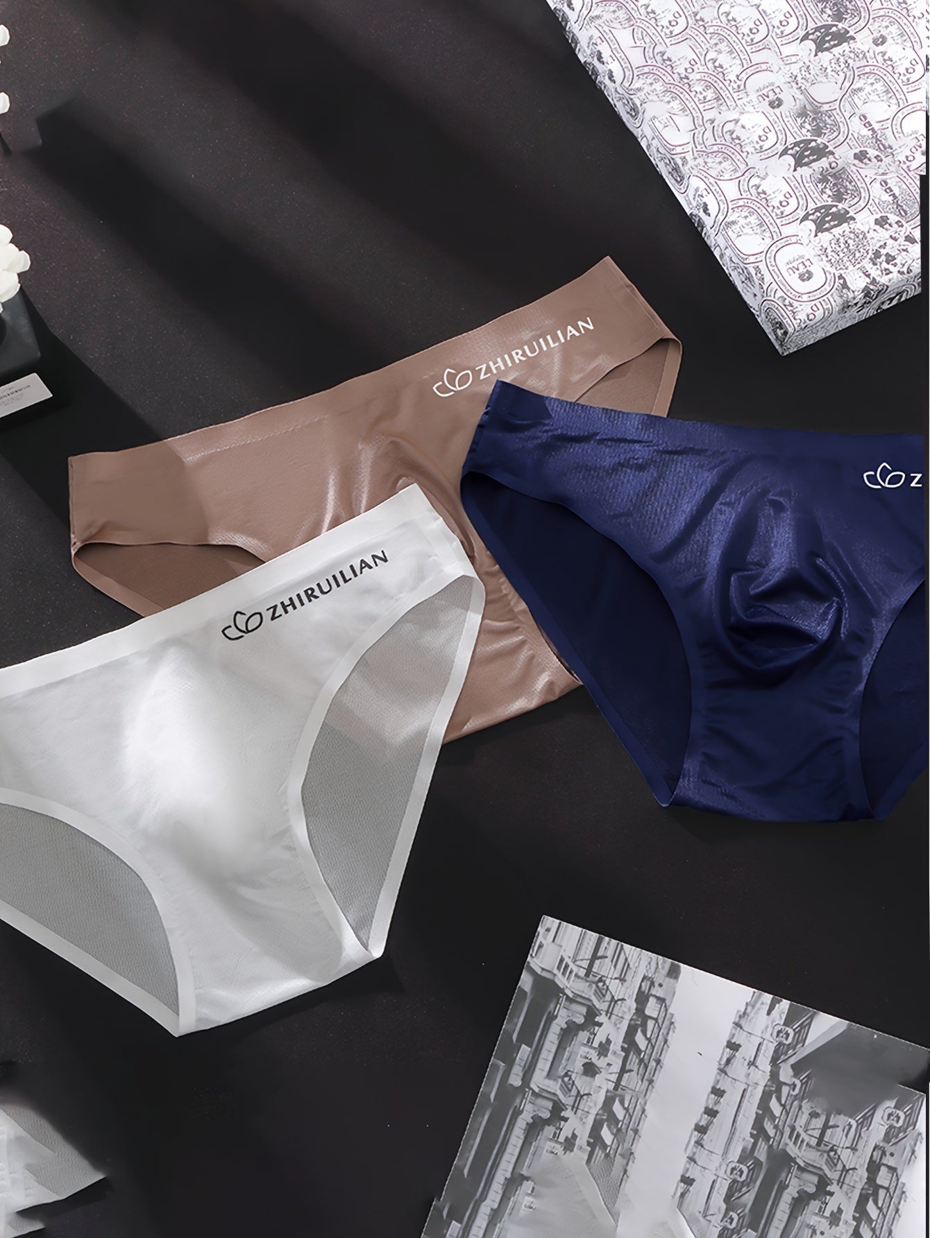 68% naylon va 32% spandeks to'qilgan matodan tayyorlangan erkaklar uchun 5 ta to'plam seamless boxer briefs. Yengil, cho'ziluvchan va qulay, bir rangli va harf bosma dizayni bilan. 150gsm.