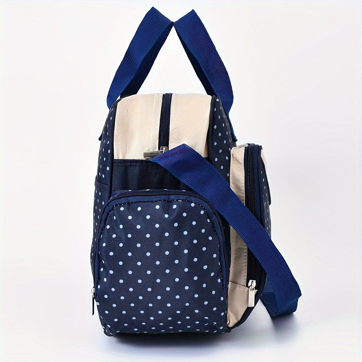 Ota-onalar uchun katta sig'imli polka nuqtali xoch sumka, harakatda bo'lgan onalar uchun mukammal ko'chma va ko'p funksiyali yelka sumkasi. Shuningdek, u pampers sumkasi sifatida ham ishlaydi.