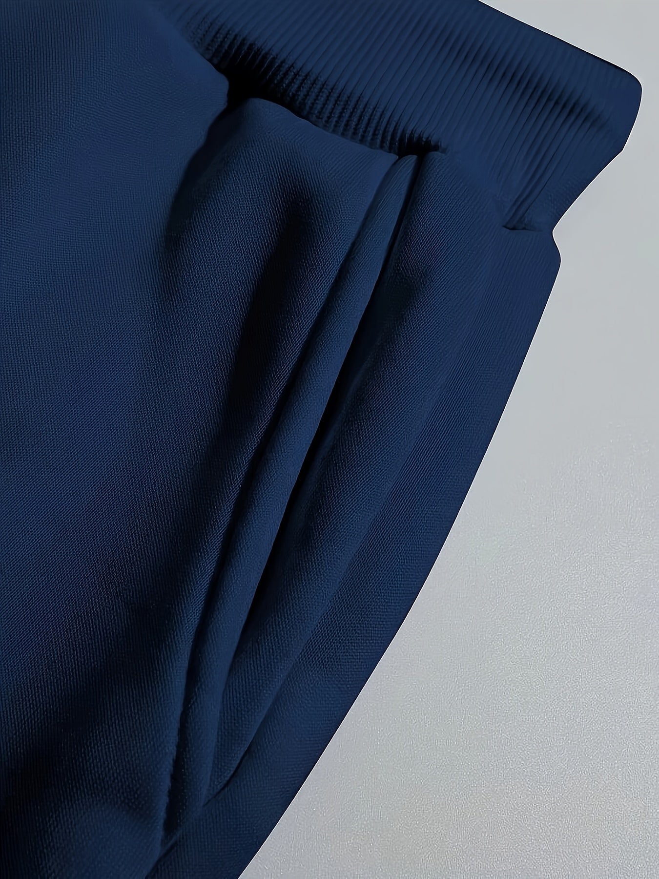 Conjunto de pijama casual para hombre con camiseta de cuello redondo de manga larga y pantalones de poliéster de punto para el otoño