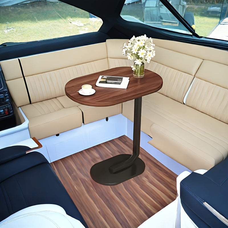 Zaytun yog'ochi va temirdan yasalgan zamonaviy C-shaklidagi divan yon stoli, mustahkam qora ramkaga ega. Turli joylar uchun mos, ixcham va bardoshli dizayn.