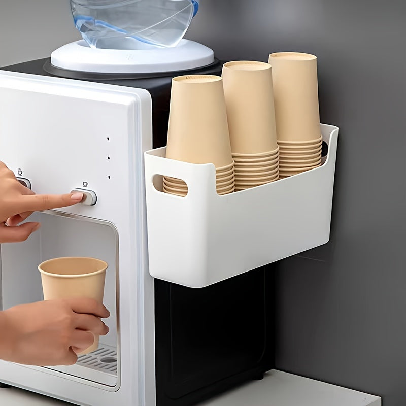 Oshxona saqlash tashkilotchisi devorga o'rnatiladigan, qog'oz stakanlar, o'ralganlar, ziravorlar uchun