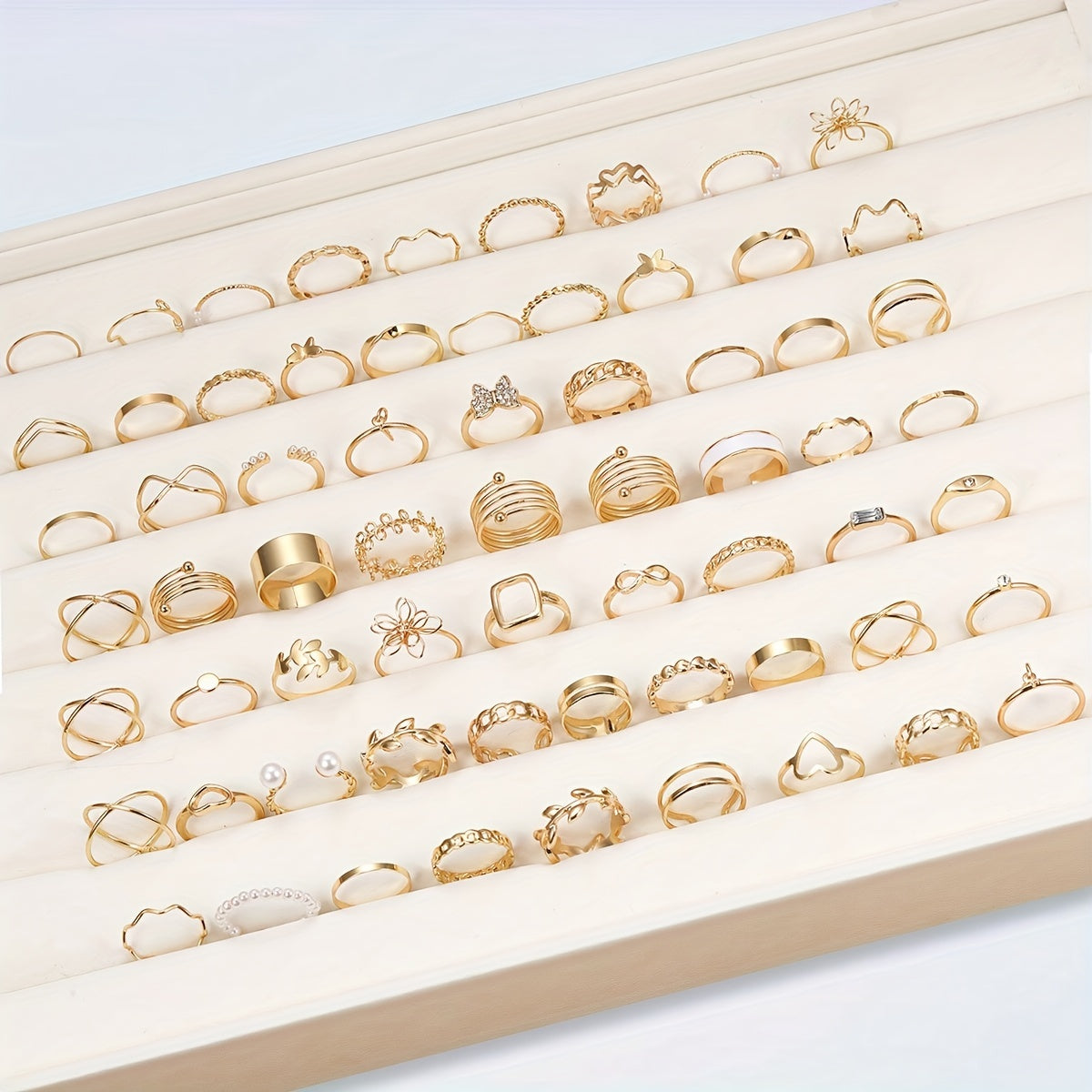 Ayollar uchun gullar, kapalaklar va yurak shaklidagi dizaynlarga ega 66 ta moda uzuklar to'plami