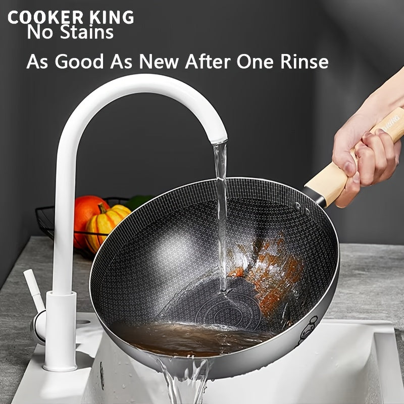 COOKING KING Non-Stick Stainless Steel Wok Pan with Lid PFOA bepul va dishwasher va pechda xavfsiz foydalanish uchun mo'ljallangan. Shuningdek, u induksiya plitkalariga mos keladi, bu uni uy oshxonalari uchun mukammal tanlov qiladi.