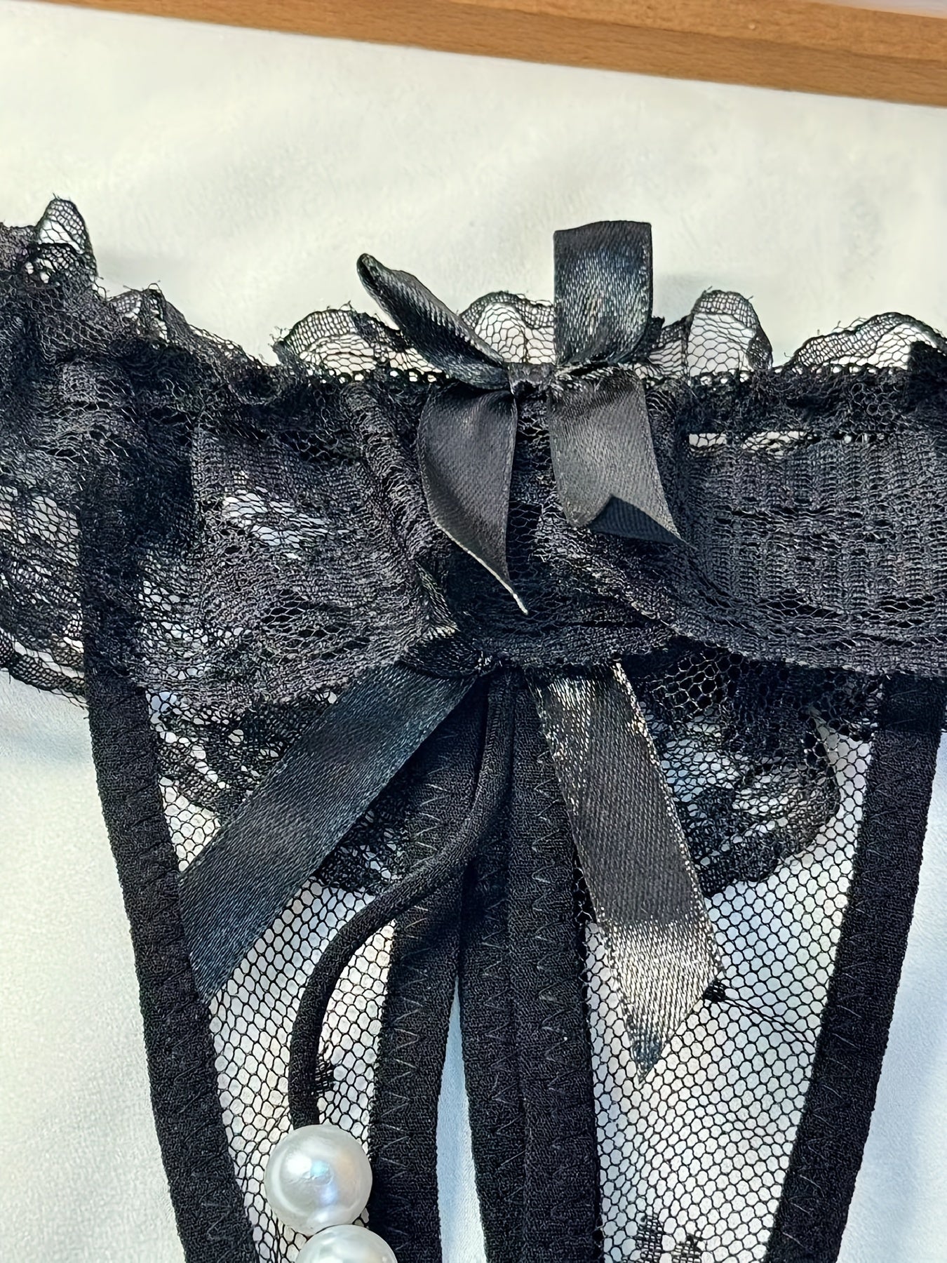 Women's Transparent Lace Crotchless Thong with Pearl Massage Details