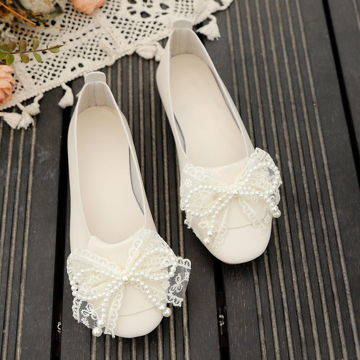 Women's White Faux Leather Slip-On Ballet Flats with Bow Embellishments