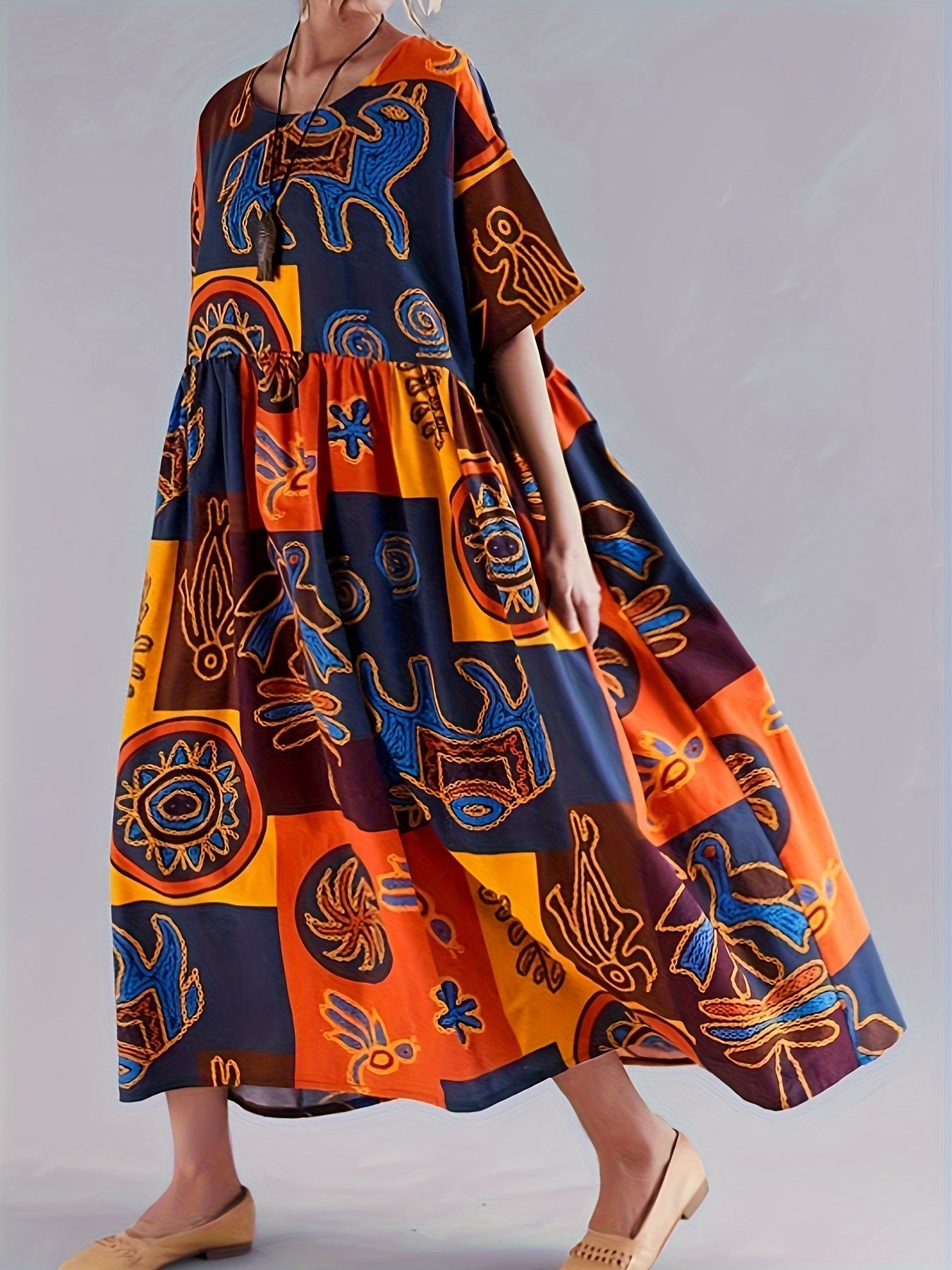 Ayollar uchun rang-barang pop san'at printi maxi ko'ylak, qisqa yenglar, dumaloq bo'yin, cho'ntaklar, erkin kesim, to'qilgan polyester aralashmasidan tayyorlangan. Bir nechta ranglarda jasur geometrik va gullar dizayni mavjud.